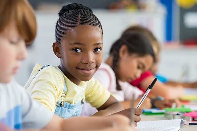 Young African-American female smiles